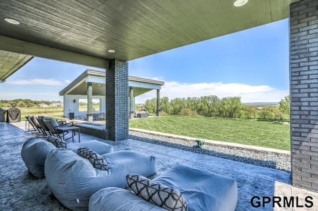 view of pool featuring a yard and a patio area