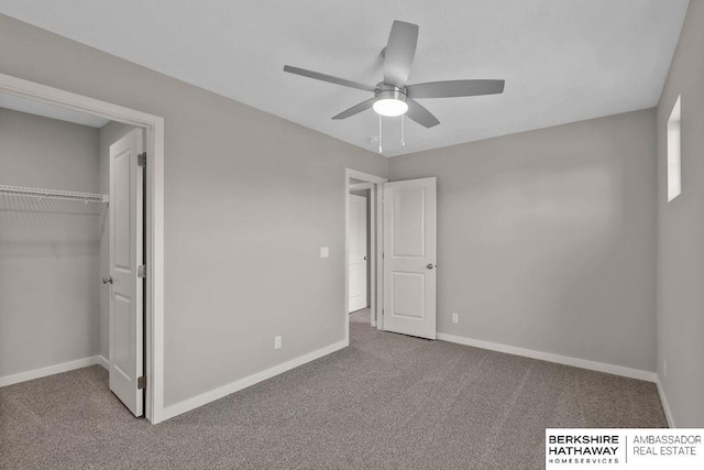 unfurnished bedroom with ceiling fan, a closet, and carpet flooring