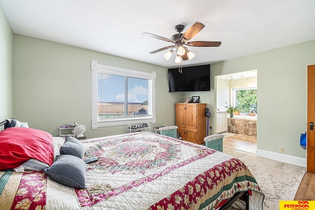 bedroom featuring light hardwood / wood-style flooring and ceiling fan