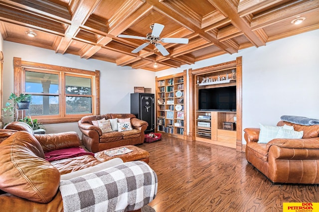 living room featuring ceiling fan, hardwood / wood-style flooring, beam ceiling, and coffered ceiling