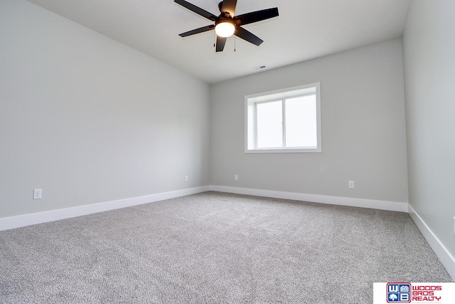 unfurnished room with carpet and ceiling fan