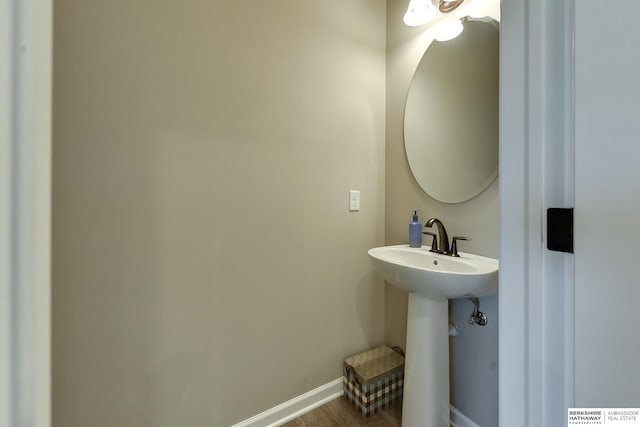 bathroom featuring hardwood / wood-style flooring