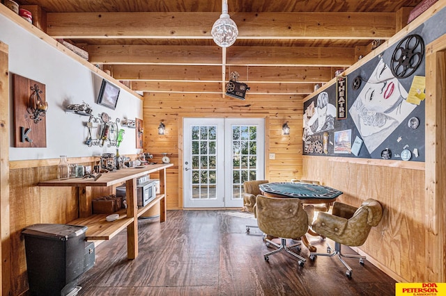 interior space featuring hardwood / wood-style flooring, wooden walls, beam ceiling, and wooden ceiling