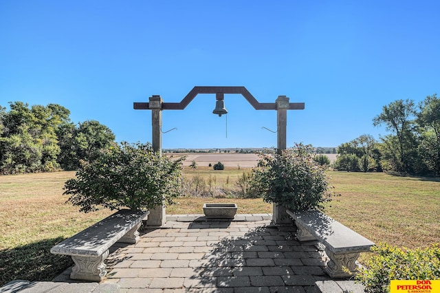 view of patio with a fire pit