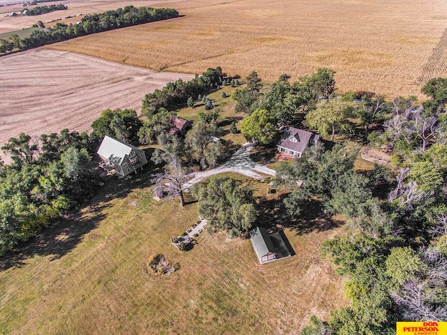 birds eye view of property featuring a rural view