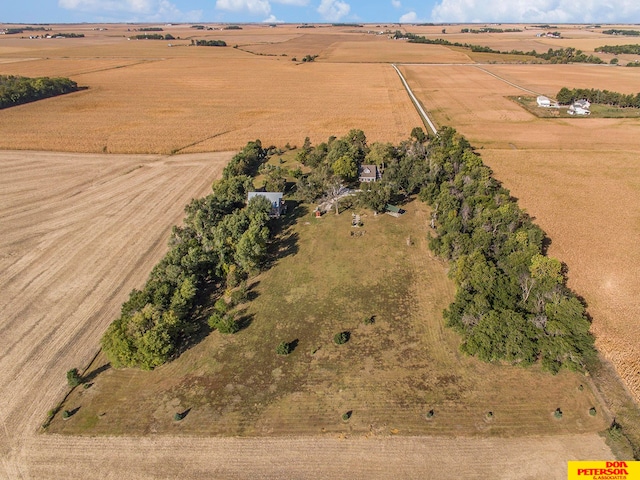 birds eye view of property featuring a rural view