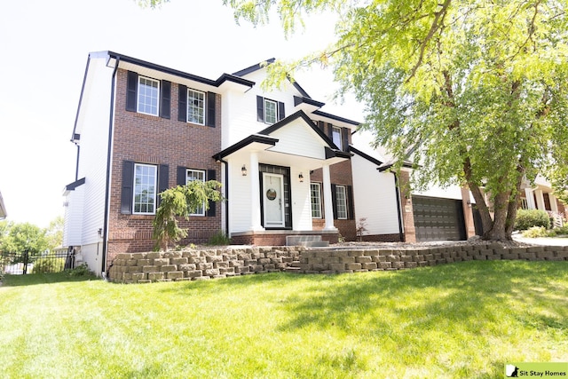 view of front of home with a front lawn