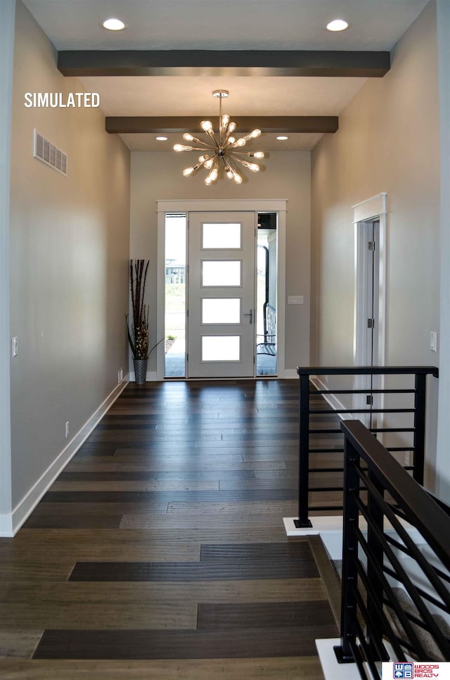 foyer entrance featuring a notable chandelier, beam ceiling, and dark hardwood / wood-style flooring