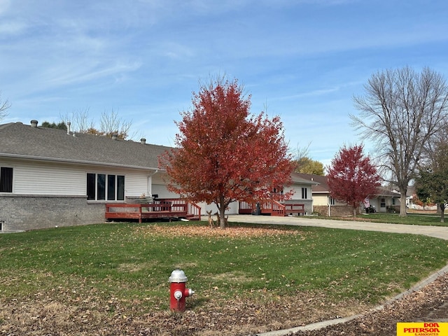 view of yard featuring a deck