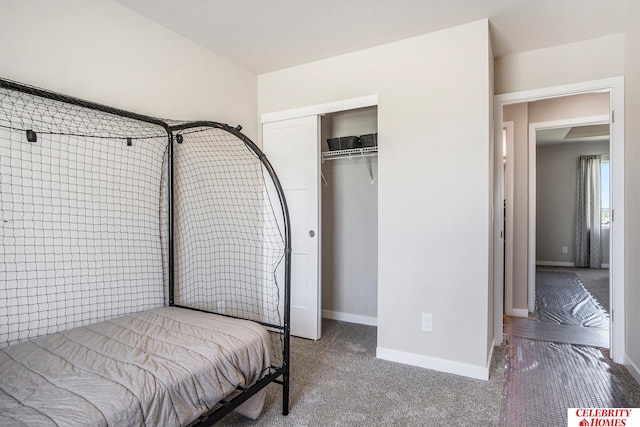 bedroom featuring a closet and carpet flooring