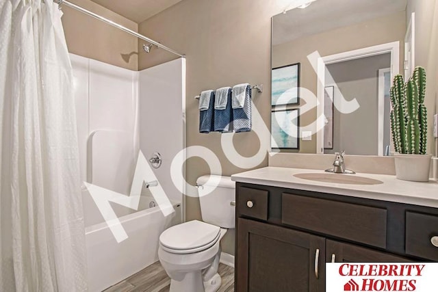 full bathroom featuring toilet, hardwood / wood-style flooring, shower / bathtub combination with curtain, and vanity