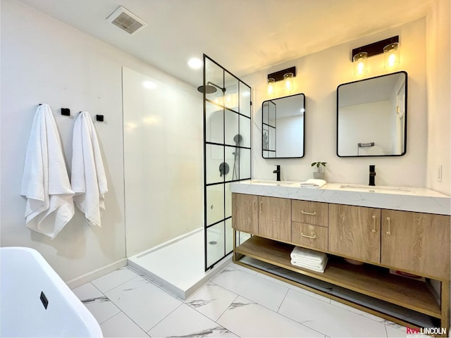 3800 SW 16th St, Lincoln, NE 68522 - bathroom featuring visible vents, marble finish floor, a sink, walk in shower, and double vanity