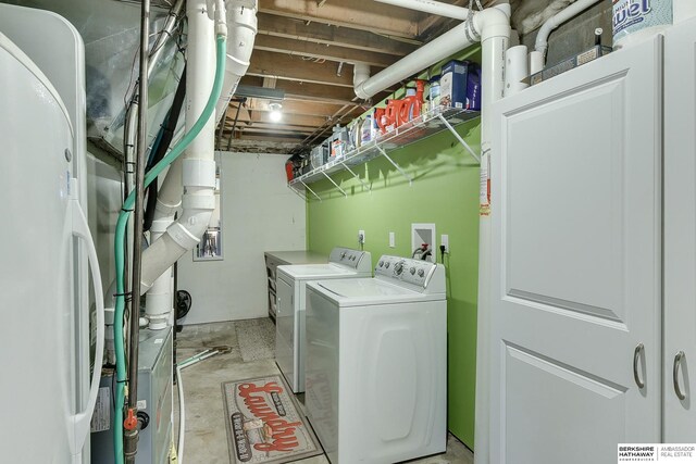 laundry room with separate washer and dryer