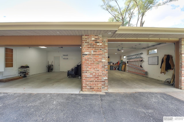 garage featuring a carport