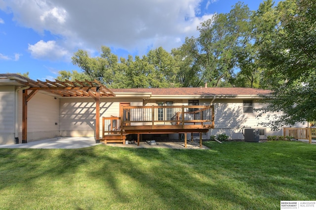 back of property featuring a lawn, a pergola, central AC, a patio area, and a deck