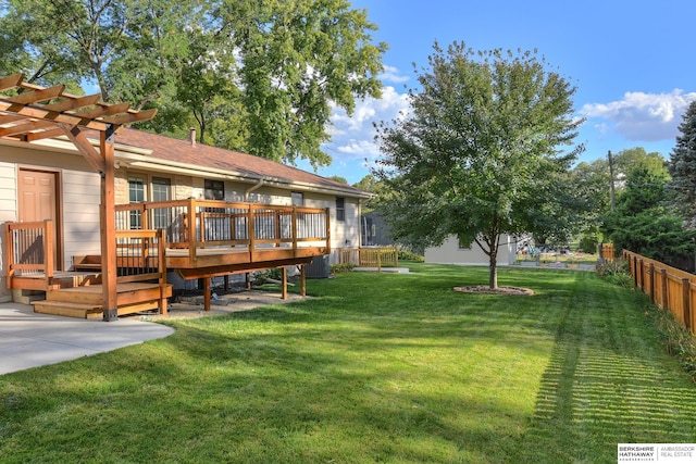 view of yard with a pergola, central air condition unit, and a wooden deck