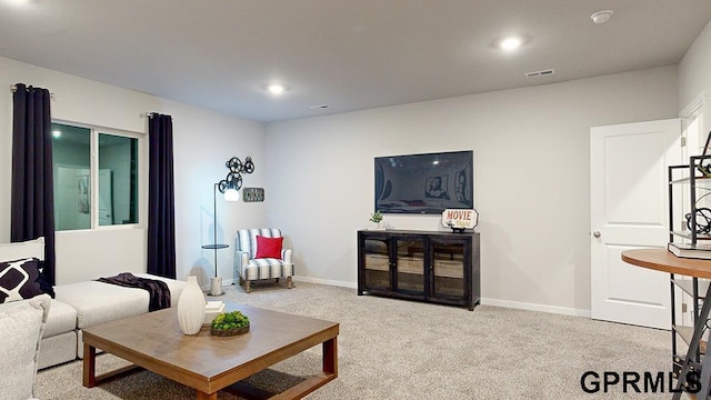 living room featuring light carpet