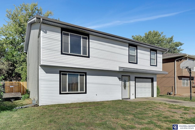 view of front of property with a garage and a front yard