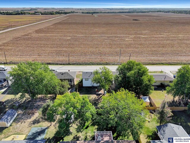 birds eye view of property featuring a rural view