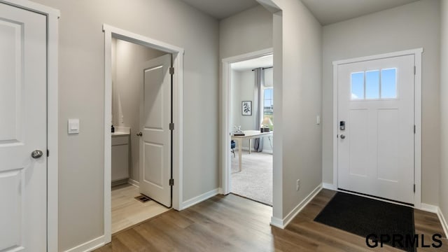 entrance foyer with hardwood / wood-style flooring