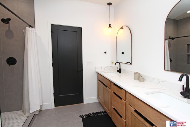 bathroom with vanity, tile patterned floors, and a shower with shower curtain