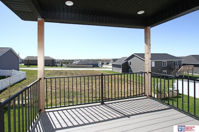 wooden deck with a yard