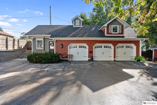 view of front of home with a garage