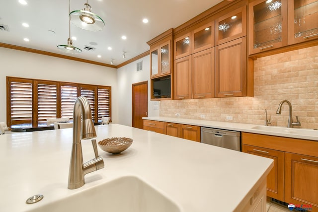 kitchen with decorative backsplash, sink, decorative light fixtures, and stainless steel dishwasher