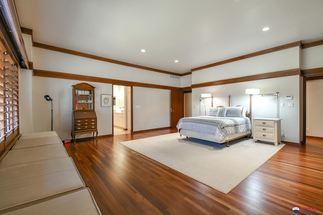 unfurnished bedroom featuring crown molding and dark hardwood / wood-style flooring