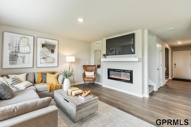 living room with wood-type flooring