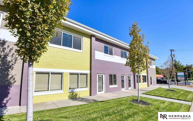 view of home's exterior featuring a lawn