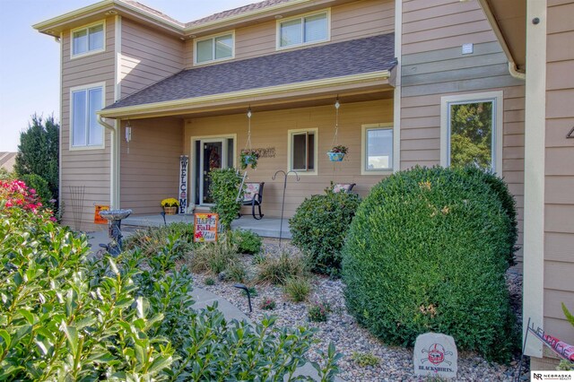 view of front of home featuring covered porch