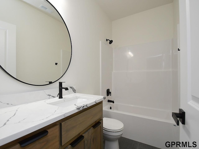 full bathroom featuring vanity, shower / bath combination, and toilet