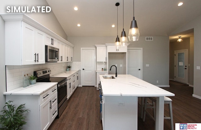 kitchen with sink, tasteful backsplash, a kitchen island with sink, white cabinets, and appliances with stainless steel finishes