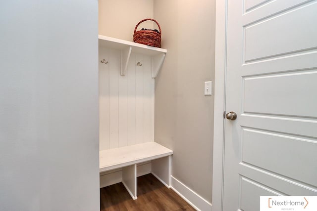 mudroom with dark wood-type flooring