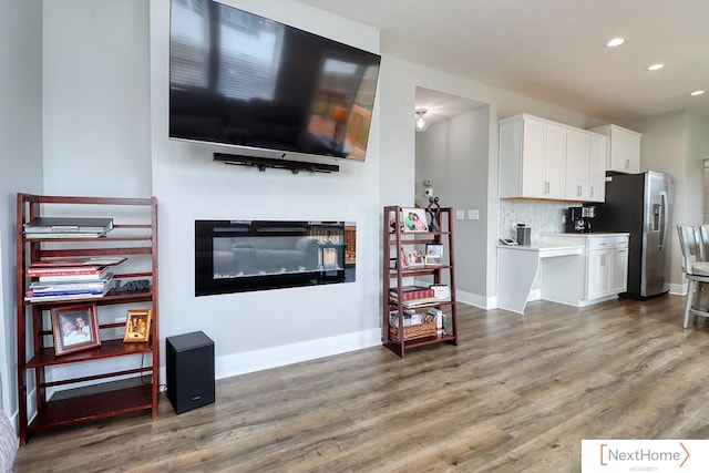 living room featuring dark wood-type flooring