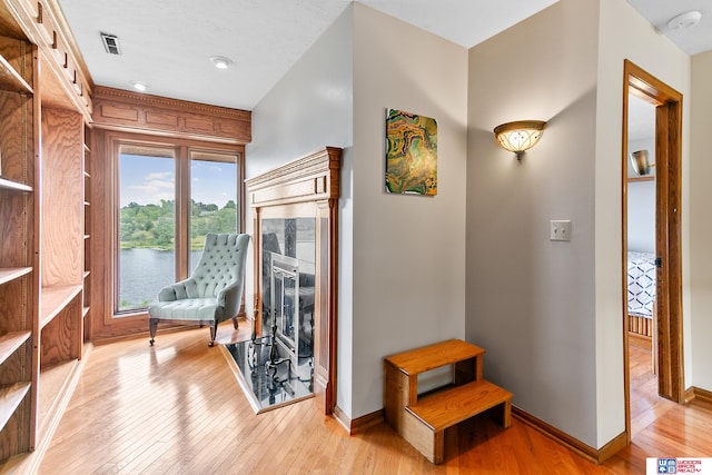 sitting room featuring light wood-type flooring