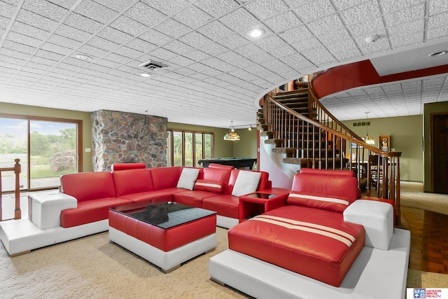 living room with pool table and a healthy amount of sunlight