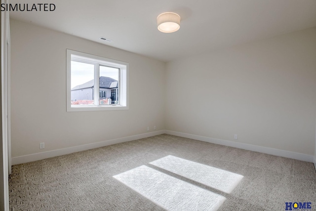 unfurnished room featuring carpet flooring