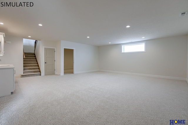 basement with light colored carpet