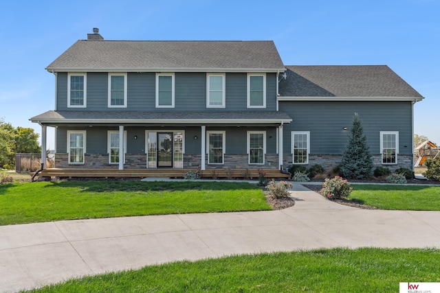 view of front of house featuring a front lawn and a porch