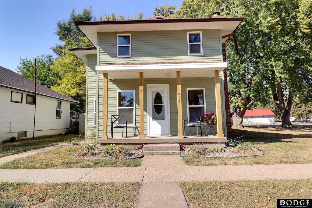 front of property featuring covered porch