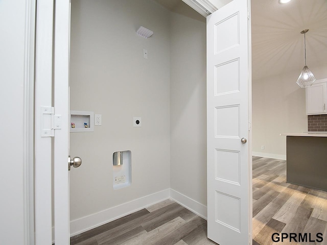 laundry room with washer hookup, hardwood / wood-style flooring, and hookup for an electric dryer