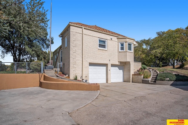 view of home's exterior featuring a garage