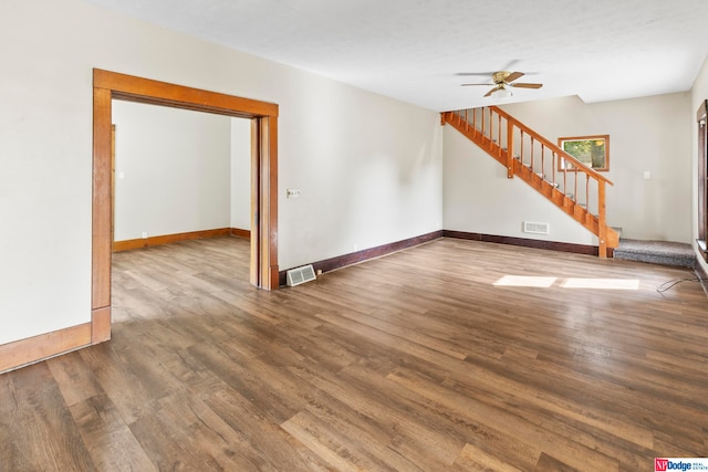 spare room featuring ceiling fan and wood-type flooring