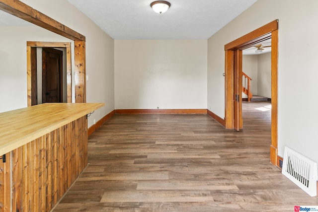 interior space with dark hardwood / wood-style floors