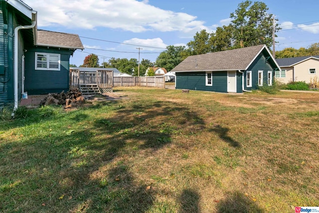 view of yard featuring a wooden deck