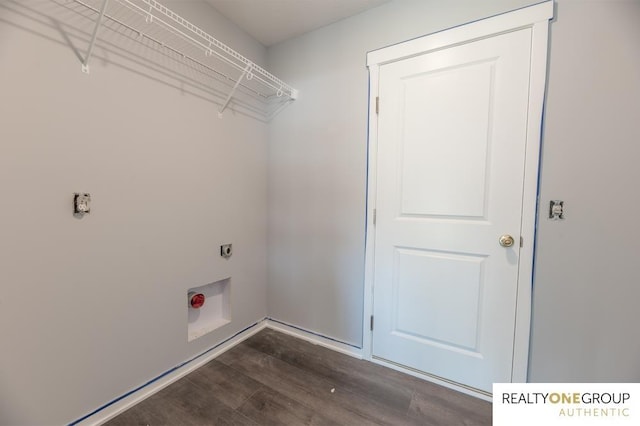 clothes washing area with dark wood-type flooring and electric dryer hookup