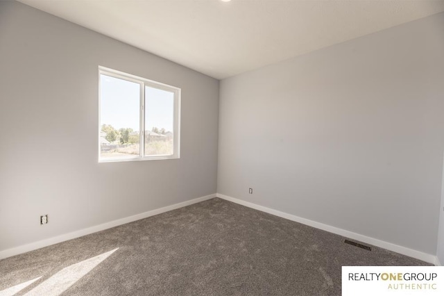 unfurnished room featuring carpet floors