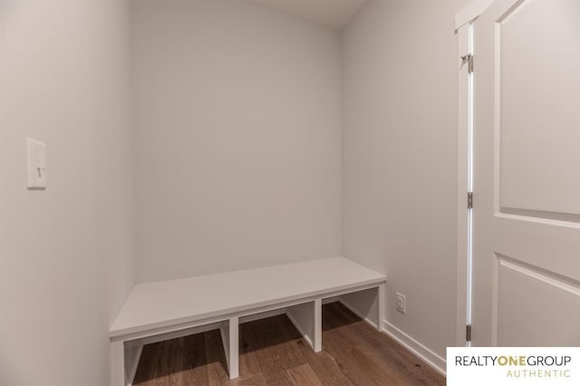 mudroom with wood finished floors and baseboards